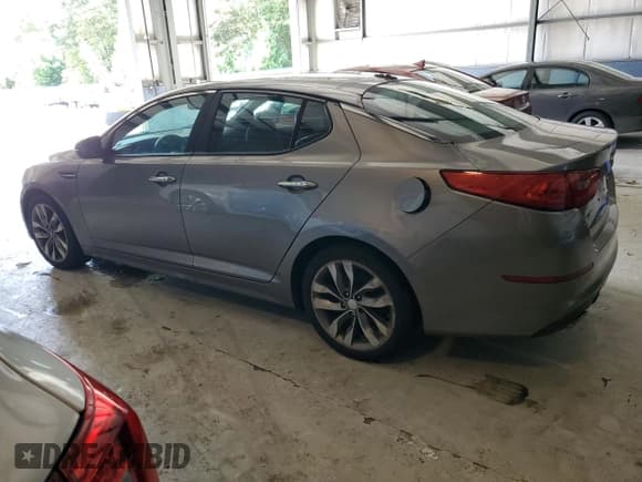 ✅ 2014 Kia Optima SX • VIN: 5XXGR4A74EG333007 • Лот: 83864825. Опубликован ранее на Copart с пробегом 233 067 миль. Бесплатный доступ к архиву аукционных продаж из США и подробный отчёт об истории автомобиля на DreamBid. Изображение 2.