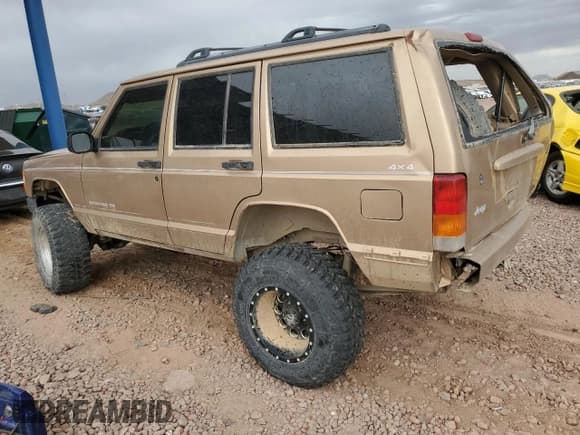 ✅ 1999 Jeep Cherokee Limited • VIN: 1J4FF78S8XL552596 • Lot: 49181115. Listed on Copart with 141,434 mi. Free auction sales archive from the USA and detailed vehicle history report at DreamBid. Image 2.
