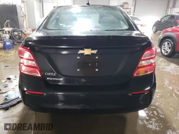 2017 Chevrolet Sonic LS с VIN 1G1JB5SH9H4142455, выставлен на аукционе Copart как лот 81320323 с пробегом 125 475 миль миль и Списание • Salvage title. История ставок и продаж доступна на DreamBid. Изображение 6.