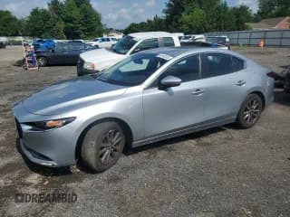 ✅ 2021 Mazda 3 2.0 • VIN: JM1BPAA75M1344638 • Lot: 64180245. Listed on Copart with 57,743 mi. Free auction sales archive from the USA and detailed vehicle history report at DreamBid. Image 1.