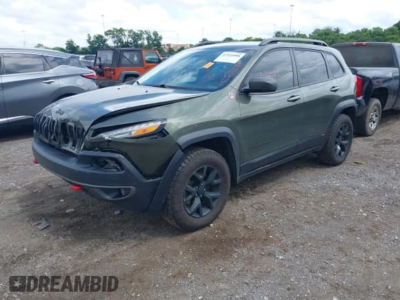 ✅ 2018 Jeep Cherokee Trailhawk • VIN: 1C4PJMBX2JD609467 • Lot: 42514088. Listed on IAAI with 135,139 mi. Free auction sales archive from the USA and detailed vehicle history report at DreamBid. Image 2.