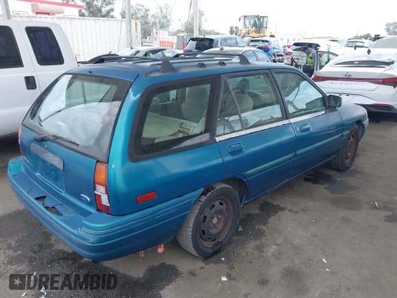 ✅ 1994 Ford Escort • VIN: 3FARP15J4RR144017 • Lot: 42398050. Listed on IAAI with 81,539 mi. Free auction sales archive from the USA and detailed vehicle history report at DreamBid. Image 4.