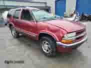 2001 Chevrolet Blazer LT z VIN 1GNDT13W012153280, wystawiony jako Copart lot #85602694 z przebiegiem 119 810 mil mil oraz Szkoda całkowita • Salvage title. Historia ofert i sprzedaży dostępna na DreamBid. Obrazek 4.