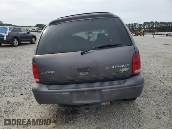 ✅ 2003 Dodge Durango Sport • VIN: 1D4HR38N13F619415 • Лот: 82314155. Опубликован ранее на Copart с пробегом 284 295 миль. Бесплатный доступ к архиву аукционных продаж из США и подробный отчёт об истории автомобиля на DreamBid. Изображение 6.