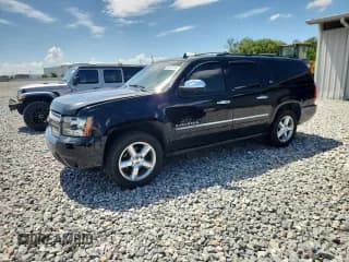 ✅ 2011 Chevrolet Suburban LTZ • VIN: 1GNSKKE35BR402068 • Lot: 80692585. Listed on Copart with 174,491 mi. Free auction sales archive from the USA and detailed vehicle history report at DreamBid. Image 1.