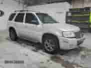 2007 Mercury Mariner Premier с VIN 4M2CU971X7KJ11281, выставлен на аукционе Copart как лот 70717105 с пробегом 149 938 миль миль и Списание • Salvage title. История ставок и продаж доступна на DreamBid. Изображение 4.