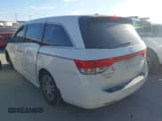 ✅ 2015 Honda Odyssey Touring Elite • VIN: 5FNRL5H96FB060244 • Lot: 43701520. Listed on IAAI with 185,250 mi. Free auction sales archive from the USA and detailed vehicle history report at DreamBid. Image 3.