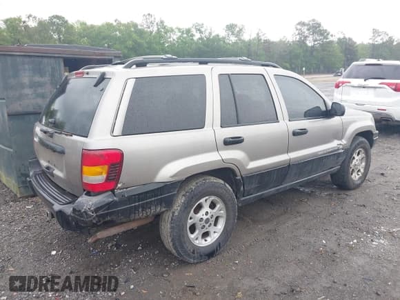 ✅ 1999 Jeep Grand Cherokee Laredo • VIN: 1J4G258SXXC518647 • Лот: 42124724. Опубликован ранее на IAAI с пробегом 229 668 миль. Бесплатный доступ к архиву аукционных продаж из США и подробный отчёт об истории автомобиля на DreamBid. Изображение 4.