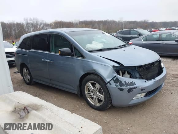 ✅ 2011 Honda Odyssey Touring • VIN: 5FNRL5H90BB060864 • Lot: 43756563. Listed on IAAI with 183,992 mi. Free auction sales archive from the USA and detailed vehicle history report at DreamBid. Image 14.