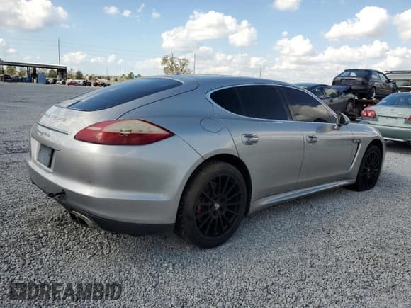 ✅ 2012 Porsche Panamera Turbo • VIN: WP0AC2A71CL090331 • Лот: 76423854. Опубликован ранее на Copart с пробегом 68 638 миль. Бесплатный доступ к архиву аукционных продаж из США и подробный отчёт об истории автомобиля на DreamBid. Изображение 3.
