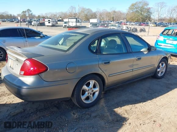 ✅ 2003 Ford Taurus SES Standard • VIN: 1FAFP55U53A244634 • Lot: 43777661. Wystawiony na IAAI z przebiegiem 214 208 mil. Bezpłatny archiwum sprzedaży aukcyjnych z USA i szczegółowy raport historii pojazdu na DreamBid. Zdjęcie 4.