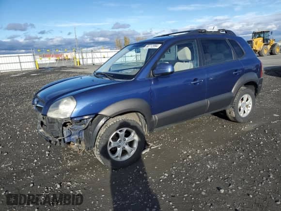 2009 Hyundai Tucson SE with VIN KM8JN72D89U977046, listed as a Copart auction lot 80712994 with 60,863 mi miles and Salvage title. Bid and sale history available at DreamBid. Image 1.