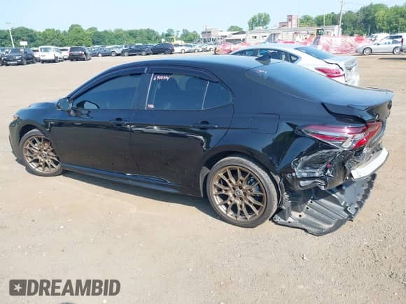 2023 Toyota Camry SE with VIN 4T1G11BKXPU097643, listed as a IAAI auction lot 42833306 with 23,580 mi miles and . Bid and sale history available at DreamBid. Image 6.
