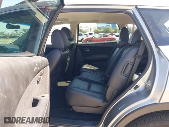 ✅ 2014 Mazda CX-9 Touring • VIN: JM3TB2CV1E0426577 • Lot: 43061325. Listed on IAAI with 109,625 mi. Free auction sales archive from the USA and detailed vehicle history report at DreamBid. Image 8.