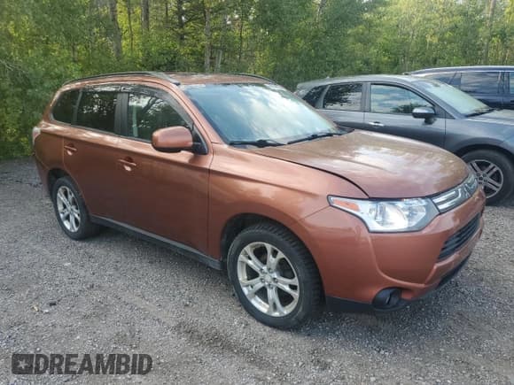 ✅ 2014 Mitsubishi Outlander ES • VIN: JA4AZ2A38EZ602074 • Lot: 69144605. Listed on Copart with 158,865 mi. Free auction sales archive from the USA and detailed vehicle history report at DreamBid. Image 4.