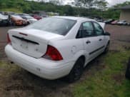 ✅ 2004 Ford Focus LX • VIN: 1FAFP33P74W164340 • Lot: 70513195. Listed on Copart with 186,485 mi. Free auction sales archive from the USA and detailed vehicle history report at DreamBid. Image 3.