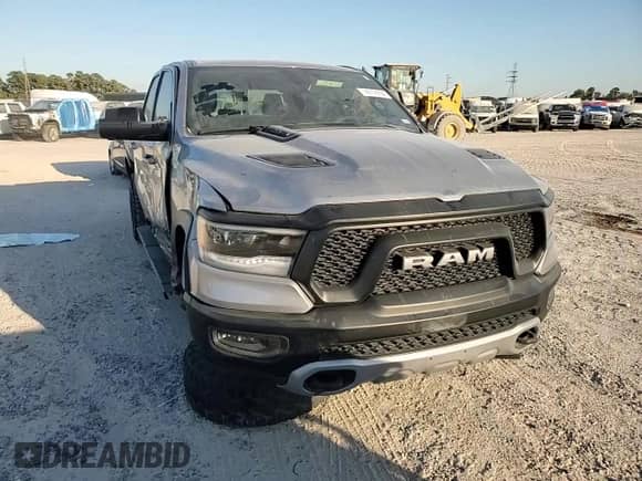 2020 Ram 1500 Rebel с VIN 1C6RRELT7LN299176, выставлен на аукционе Copart как лот 76778334 с пробегом 70 059 миль миль и Списание • Salvage title. История ставок и продаж доступна на DreamBid. Изображение 11.