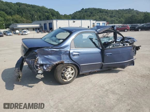 ✅ 2003 Kia Spectra • VIN: KNAFB121135213382 • Lot: 68628204. Wystawiony na Copart z przebiegiem Nie podano. Bezpłatny archiwum sprzedaży aukcyjnych z USA i szczegółowy raport historii pojazdu na DreamBid. Zdjęcie 3.