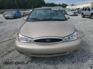 ✅ 1998 Ford Contour LX • VIN: 1FAFP66L6WK302776 • Lot: 56873245. Listed on Copart with 189,661 mi. Free auction sales archive from the USA and detailed vehicle history report at DreamBid. Image 5.