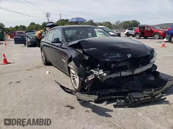 ✅ 2015 BMW 7 Series 750i xDrive • VIN: WBAYB6C5XFD966183 • Lot: 70422505. Listed on Copart with 88,599 mi. Free auction sales archive from the USA and detailed vehicle history report at DreamBid. Image 13.