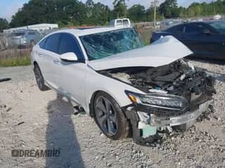 2020 Honda Accord Touring with VIN 1HGCV2F99LA005276, listed as a IAAI auction lot 43303649 with Not provided miles and . Bid and sale history available at DreamBid. Image 1.