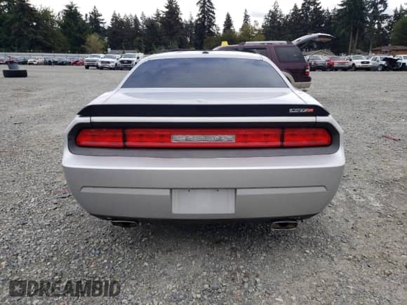 2010 Dodge Challenger SRT-8 z VIN 2B3CJ7DW7AH270018, wystawiony jako Copart lot #72088594 z przebiegiem Nie podano mil oraz Szkoda całkowita • Salvage title. Historia ofert i sprzedaży dostępna na DreamBid. Obrazek 6.