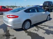 ✅ 2013 Ford Fusion SE Hybrid • VIN: 3FA6P0LU8DR262977 • Lot: 43729571. Listed on IAAI with 115,875 mi. Free auction sales archive from the USA and detailed vehicle history report at DreamBid. Image 4.