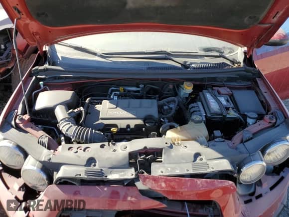 2012 Chevrolet Sonic LT z VIN 1G1JC5SB9C4171004, wystawiony jako Copart lot #73356883 z przebiegiem 155 863 mil mil oraz Szkoda całkowita • Salvage title. Historia ofert i sprzedaży dostępna na DreamBid. Obrazek 12.