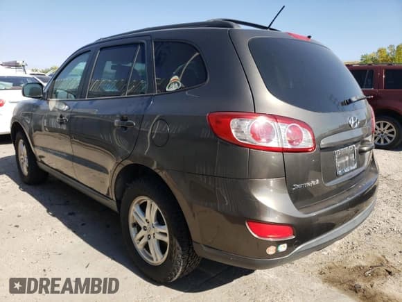 ✅ 2012 Hyundai Santa Fe GLS • VIN: 5XYZGDAB2CG152841 • Lot: 69445724. Listed on Copart with 131,617 mi. Free auction sales archive from the USA and detailed vehicle history report at DreamBid. Image 2.