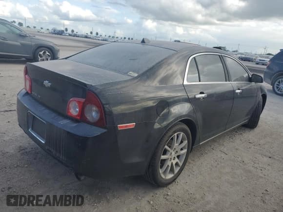 ✅ 2012 Chevrolet Malibu LTZ • VIN: 1G1ZG5E72CF293321 • Lot: 79355424. Listed on Copart with 185,569 mi. Free auction sales archive from the USA and detailed vehicle history report at DreamBid. Image 3.