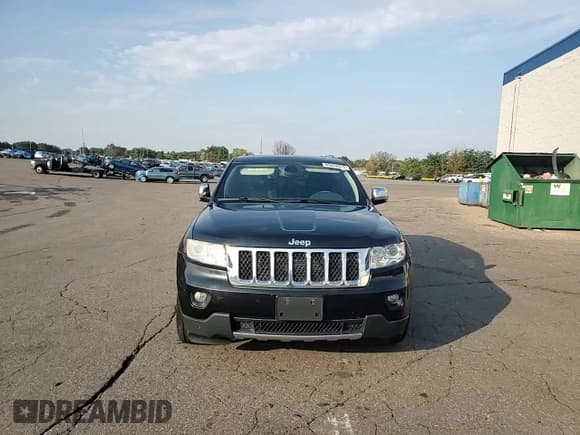 ✅ 2012 Jeep Grand Cherokee Overland • VIN: 1C4RJFCG0CC200346 • Lot: 85882075. Listed on Copart with 161,948 mi. Free auction sales archive from the USA and detailed vehicle history report at DreamBid. Image 14.