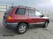 2002 Hyundai Santa Fe GLS z VIN KM8SC13D02U173092, wystawiony jako Copart lot #87683115 z przebiegiem 96 950 mil mil oraz Szkoda całkowita • Salvage title. Historia ofert i sprzedaży dostępna na DreamBid. Obrazek 3.