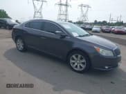 ✅ 2013 Buick LaCrosse Leather • VIN: 1G4GC5E38DF120956 • Lot: 42510324. Listed on IAAI with 127,260 mi. Free auction sales archive from the USA and detailed vehicle history report at DreamBid. Image 1.