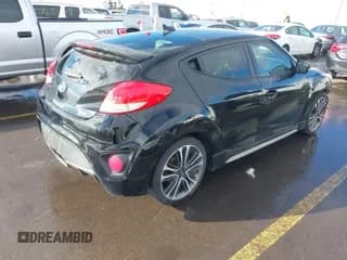 ✅ 2016 Hyundai Veloster Turbo Rally Edition • VIN: KMHTC6AE9GU255472 • Lot: 41583533. Wystawiony na IAAI z przebiegiem 138 094 mil. Bezpłatny archiwum sprzedaży aukcyjnych z USA i szczegółowy raport historii pojazdu na DreamBid. Zdjęcie 4.