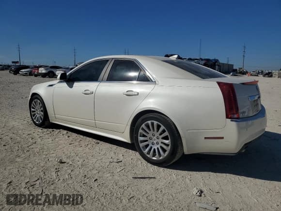 ✅ 2013 Cadillac CTS Premium • VIN: 1G6DP5E33D0153588 • Лот: 46529515. Опубликован ранее на Copart с пробегом 103 980 миль. Бесплатный доступ к архиву аукционных продаж из США и подробный отчёт об истории автомобиля на DreamBid. Изображение 2.
