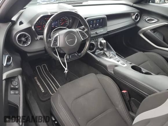 2019 Chevrolet Camaro 1LT с VIN 1G1FB3DX7K0122301, выставлен на аукционе Copart как лот 67852665 с пробегом 69 346 миль миль и Списание • Salvage title. История ставок и продаж доступна на DreamBid. Изображение 8.