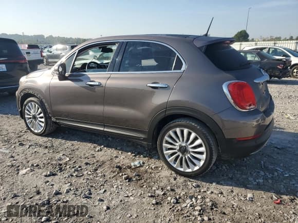 ✅ 2016 FIAT 500X Lounge • VIN: ZFBCFXDT2GP385428 • Лот: 81939805. Опубликован ранее на Copart с пробегом 122 906 миль. Бесплатный доступ к архиву аукционных продаж из США и подробный отчёт об истории автомобиля на DreamBid. Изображение 2.