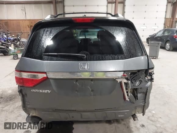 ✅ 2012 Honda Odyssey EX-L • VIN: 5FNRL5H67CB100705 • Lot: 43821207. Listed on IAAI with 105,432 mi. Free auction sales archive from the USA and detailed vehicle history report at DreamBid. Image 16.