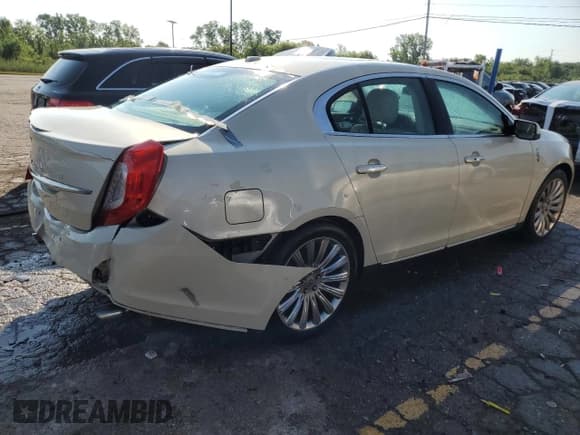 ✅ 2015 Lincoln MKS • VIN: 1LNHL9DK4FG607945 • Lot: 59343945. Wystawiony na Copart z przebiegiem 101 878 mil. Bezpłatny archiwum sprzedaży aukcyjnych z USA i szczegółowy raport historii pojazdu na DreamBid. Zdjęcie 3.