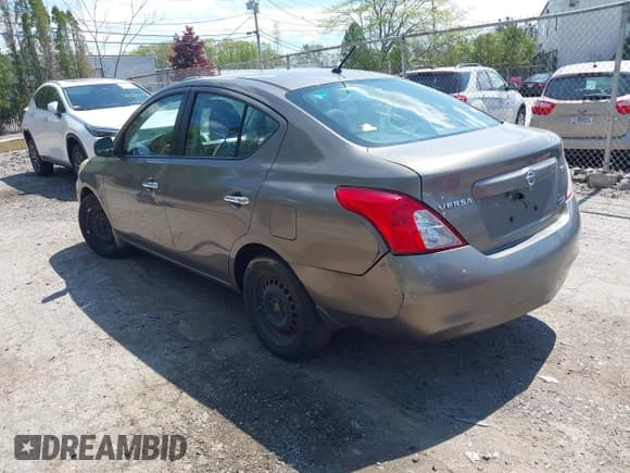 ✅ 2012 Nissan Versa SV • VIN: 3N1CN7AP2CL881944 • Lot: 42172550. Listed on IAAI with 159,299 mi. Free auction sales archive from the USA and detailed vehicle history report at DreamBid. Image 3.