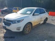 ✅ 2018 Chevrolet Equinox LT • VIN: 2GNAXJEV7J6326839 • Lot: 43398569. Listed on IAAI with 169,804 mi. Free auction sales archive from the USA and detailed vehicle history report at DreamBid. Image 2.