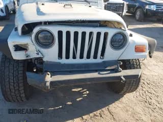 ✅ 2004 Jeep Wrangler Sport • VIN: 1J4FA49SX4P802341 • Лот: 43798997. Опубликован ранее на IAAI с пробегом 150 197 миль. Бесплатный доступ к архиву аукционных продаж из США и подробный отчёт об истории автомобиля на DreamBid. Изображение 6.