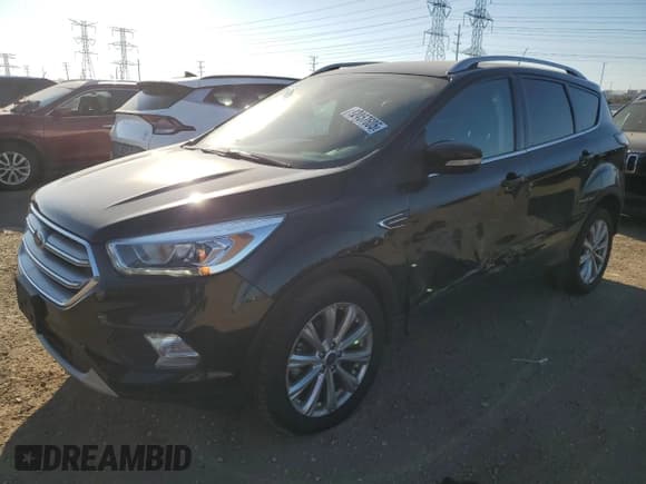 ✅ 2017 Ford Escape Titanium • VIN: 1FMCU0JD6HUA80424 • Lot: 92457605. Wystawiony na Copart z przebiegiem 86 139 mil. Bezpłatny archiwum sprzedaży aukcyjnych z USA i szczegółowy raport historii pojazdu na DreamBid. Zdjęcie 1.