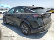 ✅ 2024 Nissan ARIYA Empower+ • VIN: JN1BF0BA7RM432056 • Lot: 60659605. Listed on Copart with 15,172 mi. Free auction sales archive from the USA and detailed vehicle history report at DreamBid. Image 2.