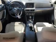 ✅ 2016 Mazda CX-5 Touring • VIN: JM3KE2CY4G0863800 • Lot: 87259645. Listed on Copart with 155,675 mi. Free auction sales archive from the USA and detailed vehicle history report at DreamBid. Image 8.