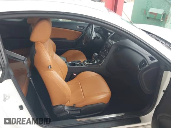 2013 Hyundai Genesis Coupe Track с VIN KMHHU6KJ8DU079797, выставлен на аукционе IAAI как лот 41394449 с пробегом 131 280 миль миль и . История ставок и продаж доступна на DreamBid. Изображение 5.