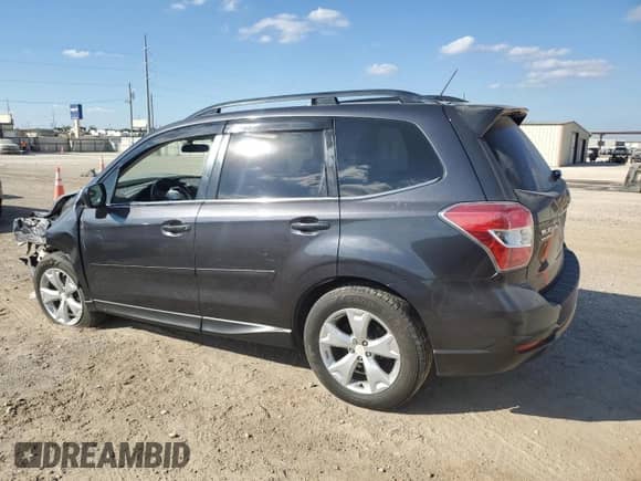 2015 Subaru Forester Limited с VIN JF2SJARC0FH425738, выставлен на аукционе Copart как лот 87301685 с пробегом 81 106 миль миль и Списание • Salvage title. История ставок и продаж доступна на DreamBid. Изображение 2.