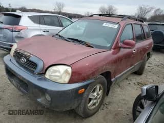 ✅ 2002 Hyundai Santa Fe GLS • VIN: KM8SC73D22U153199 • Лот: 86425594. Опубликован ранее на Copart с пробегом 252 992 миль. Бесплатный доступ к архиву аукционных продаж из США и подробный отчёт об истории автомобиля на DreamBid. Изображение 1.