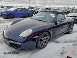 ✅ 2005 Porsche Boxster • VIN: WP0CA29895S710153 • Lot: 96147915. Listed on Copart with 107,607 mi. Free auction sales archive from the USA and detailed vehicle history report at DreamBid. Image 1.
