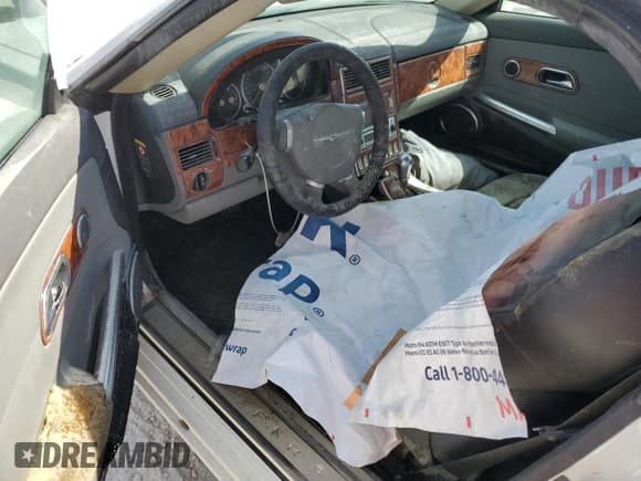 ✅ 2006 Chrysler Crossfire Limited • VIN: 1C3AN65L66X061661 • Lot: 75718584. Listed on Copart with Not provided. Free auction sales archive from the USA and detailed vehicle history report at DreamBid. Image 8.